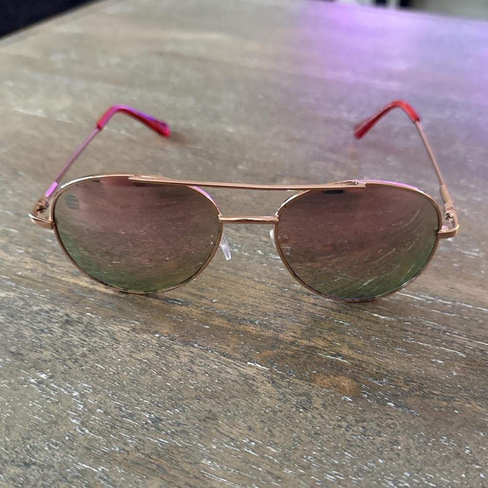 Pink and gold aviator sunglasses